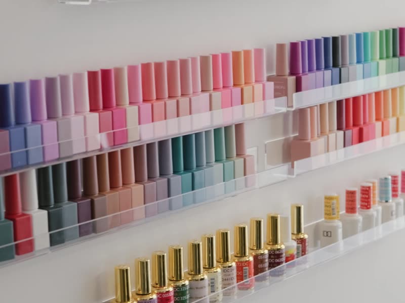 A wall of gel polish in many colours